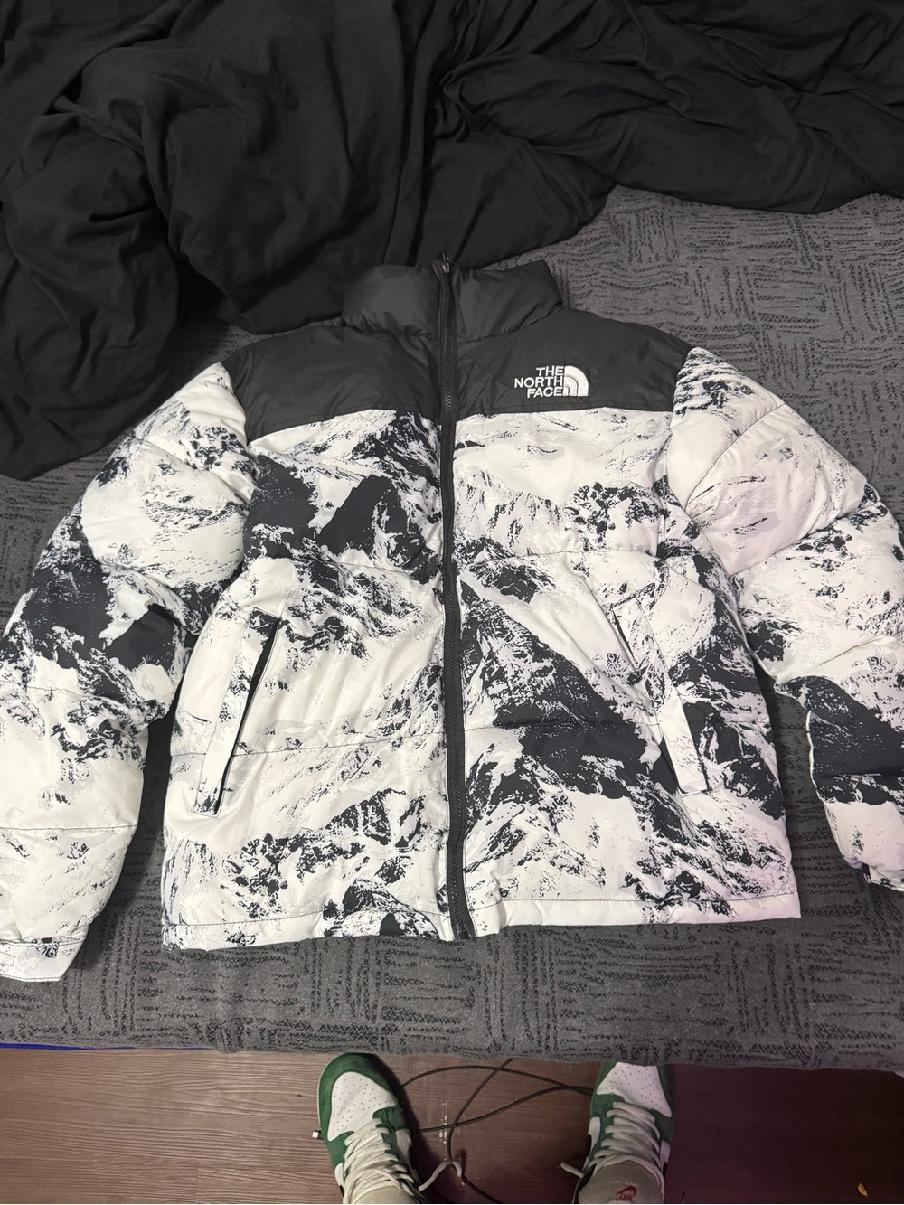 North face puffer fits like a medium men